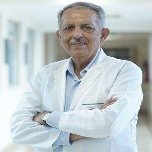 Dr. Arvind Taneja